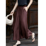 Stepping Wind ح±ùed Trousers ح Physiopsies Studded Trousers / Elegant Skirts