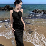 2025 Summer White Hanging Neck Sling Dress Female Vertiny Fishtail High-End Seaside Vacation Super Fairy Long Skirt
