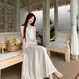 French Temperament Niche Irregular Cross-Summer Vertebry Vest Swing Skirt 2026 Summer New Fashion Suit