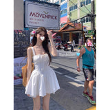 Little White Dress Women 2026 Spring New Sling Dress Four-Sided Bomb To Collect Waist Thin Inside And Outside Wearing Short Skirt