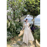 2025 High-End Design White Temperament Early Spring French Holiday Hanging Neck Hollow Embroidery Tying Dress