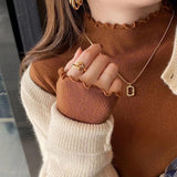 Autumn And Winter Sweater Women Bottoming Shirt Women Take The Ocean 2025 New Wooden Ear Half-High Sweater Knitted Top