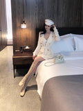 Beverly Famous Gold Button Temperament Coat In The Long-Skin Knitted Sweater